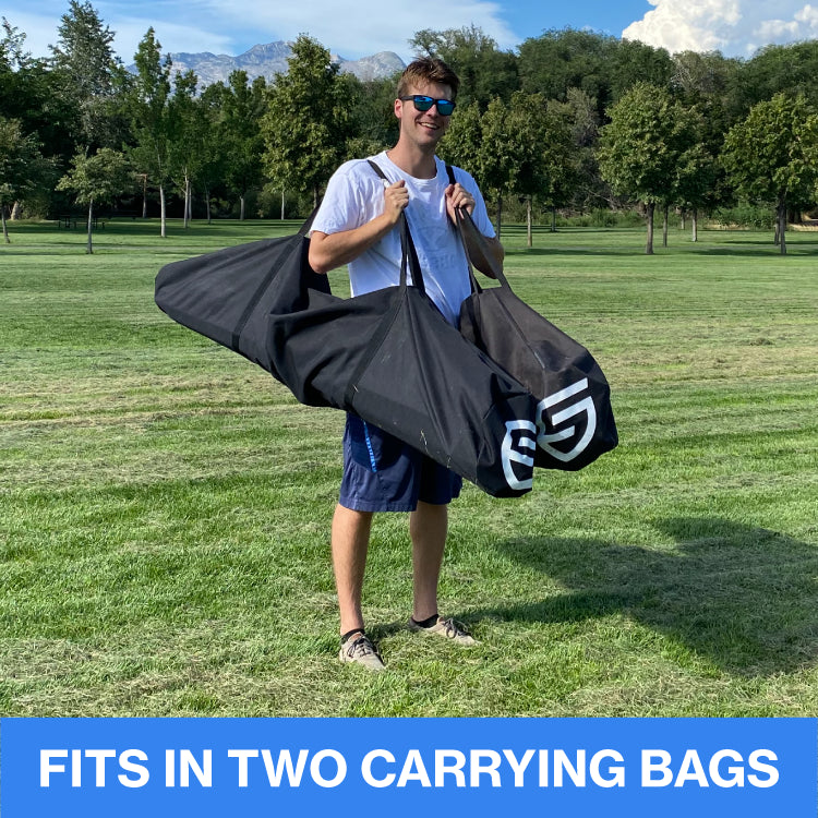 A man carrying a 9 Square Castle Squares Pro in two bags